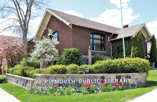 Photograph of the sign outside the Plymouth Library